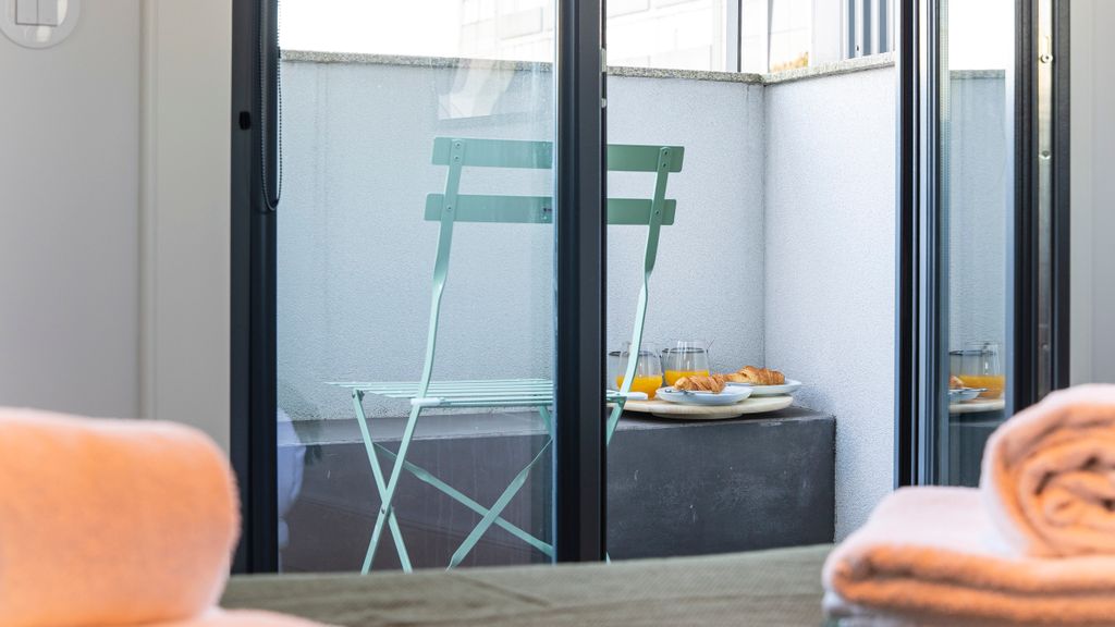 Stylish Studio w/ AC & Balcony by LovelyStay