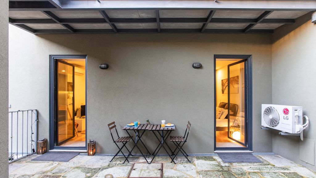 Downtown Studio w/ AC & Patio by LovelyStay