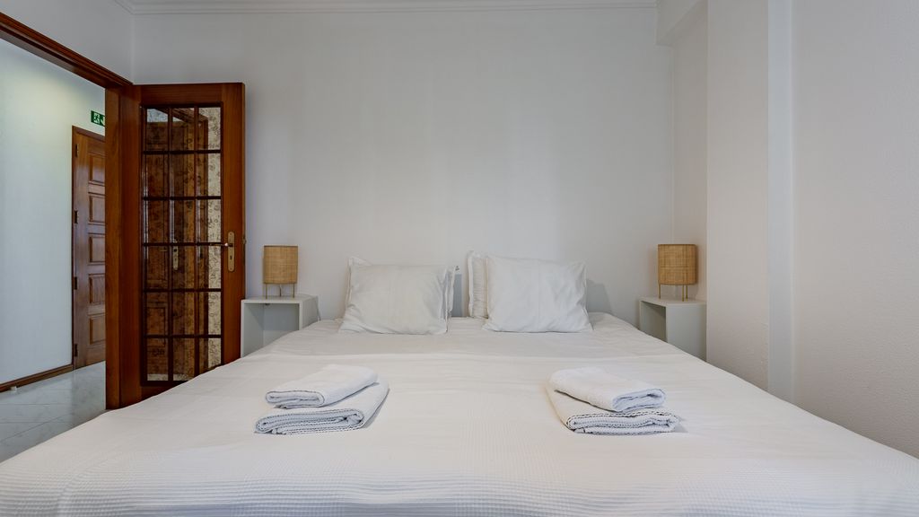 Bright 1BDR Apartment W/Balcony by LovelyStay