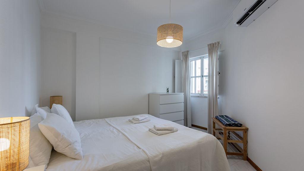 Bright 1BDR Apartment W/Balcony by LovelyStay