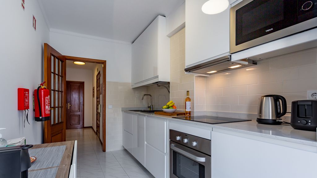Bright 1BDR Apartment W/Balcony by LovelyStay