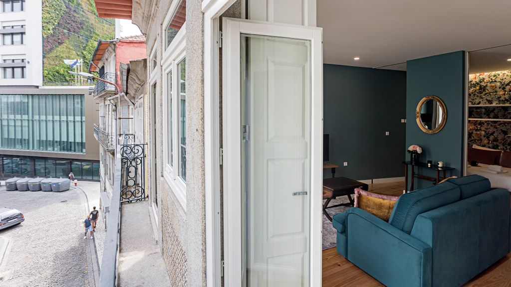 Turquoise Flat w/ AC & Balcony by LovelyStay