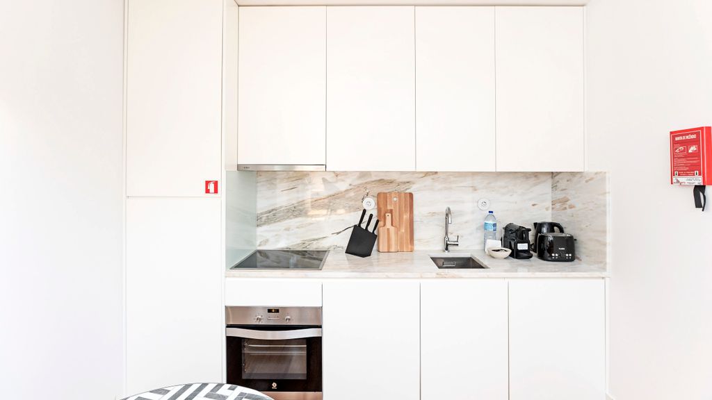 Central 2BR Apartment w/ Patio by LovelyStay