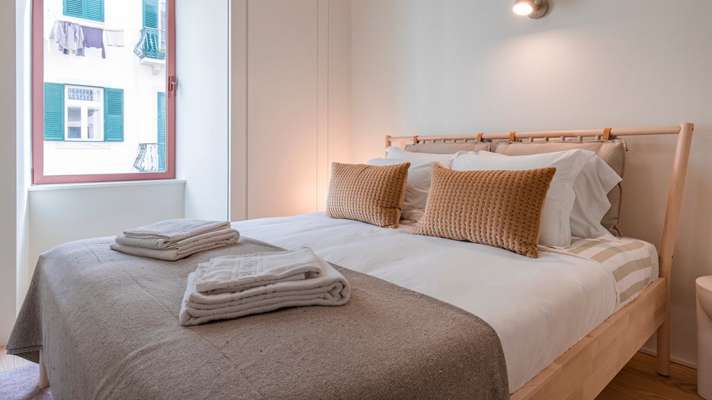 Deluxe 2BDR Apartment W/ Patio by LovelyStay