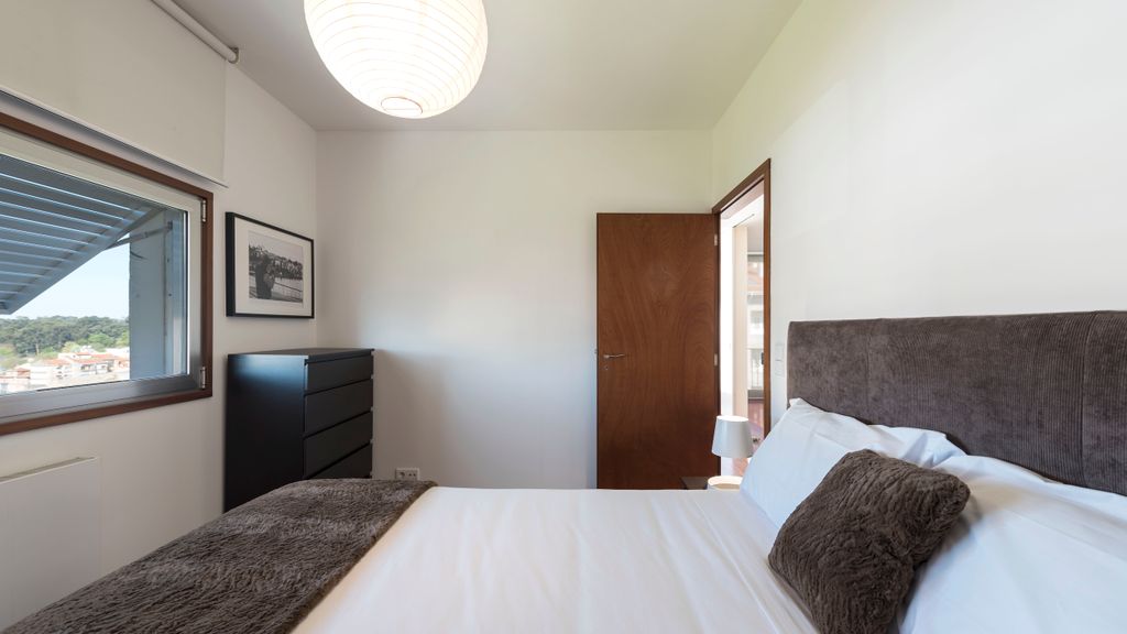 Casas Brancas w/ Balcony & Parking by LovelyStay