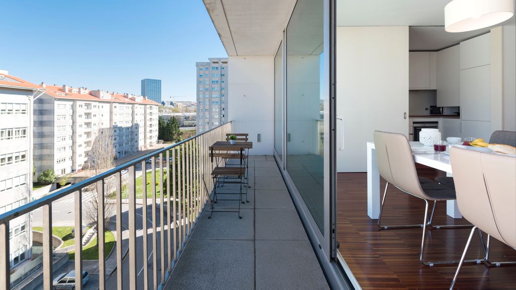Casas Brancas w/ Balcony & Parking by LovelyStay