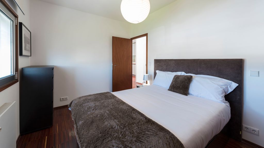 Casas Brancas w/ Balcony & Parking by LovelyStay