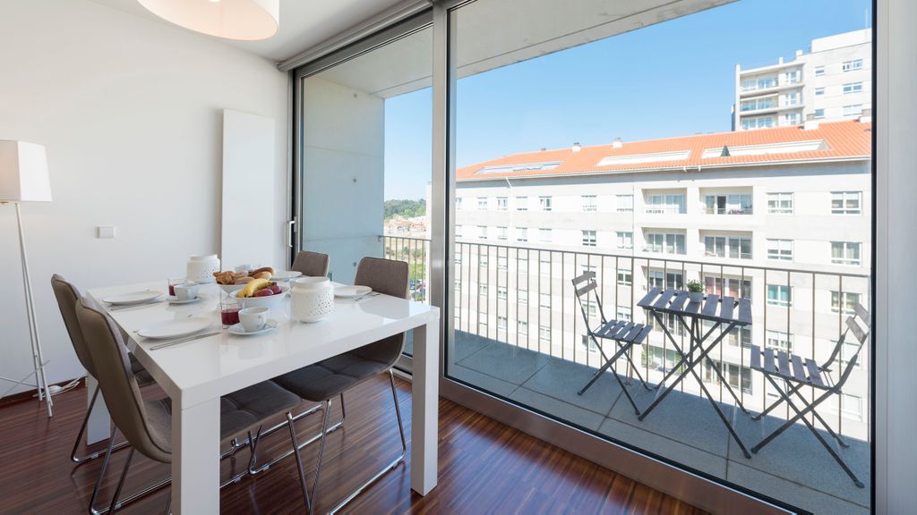 Casas Brancas w/ Balcony & Parking by LovelyStay