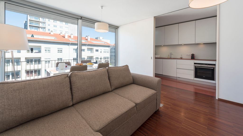 Casas Brancas w/ Balcony & Parking by LovelyStay