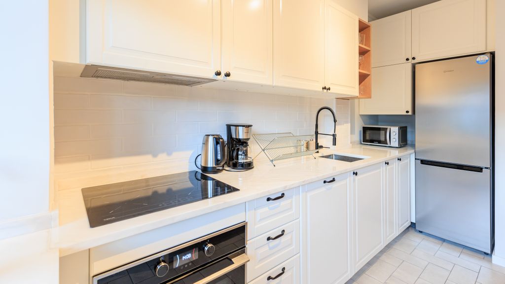 Enjoy Bonfim Central 2BR Apartment by LovelyStay