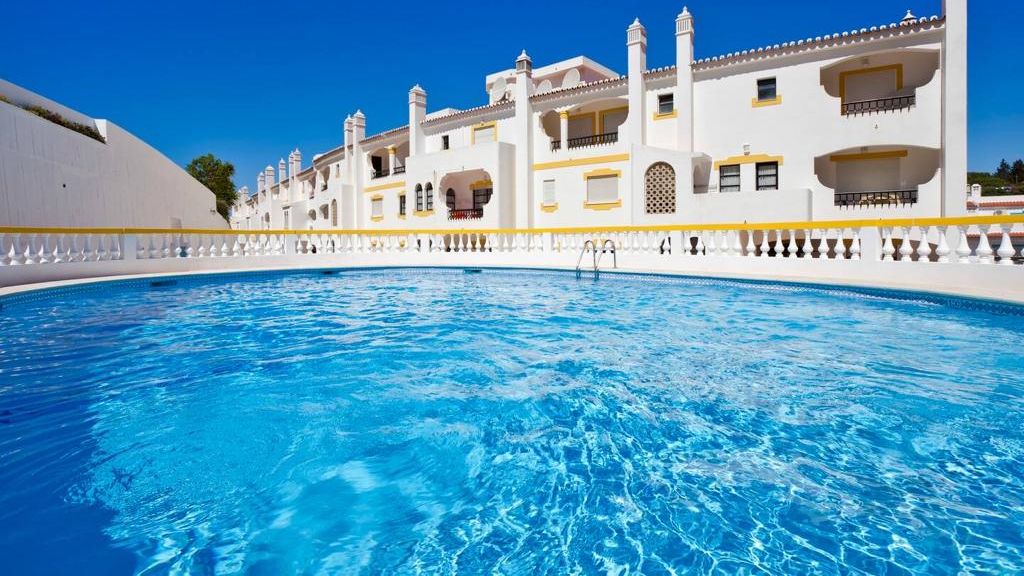 Sunny Duplex W/ Pool & Balcony by LovelyStay