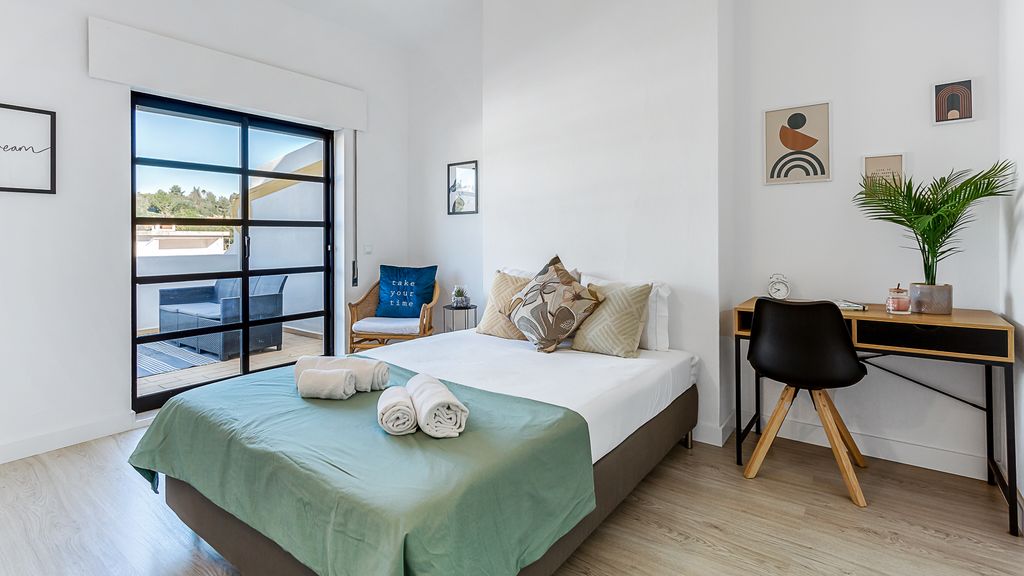 Sunny Duplex W/ Pool & Balcony by LovelyStay