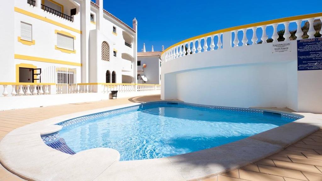 Sunny Duplex W/ Pool & Balcony by LovelyStay