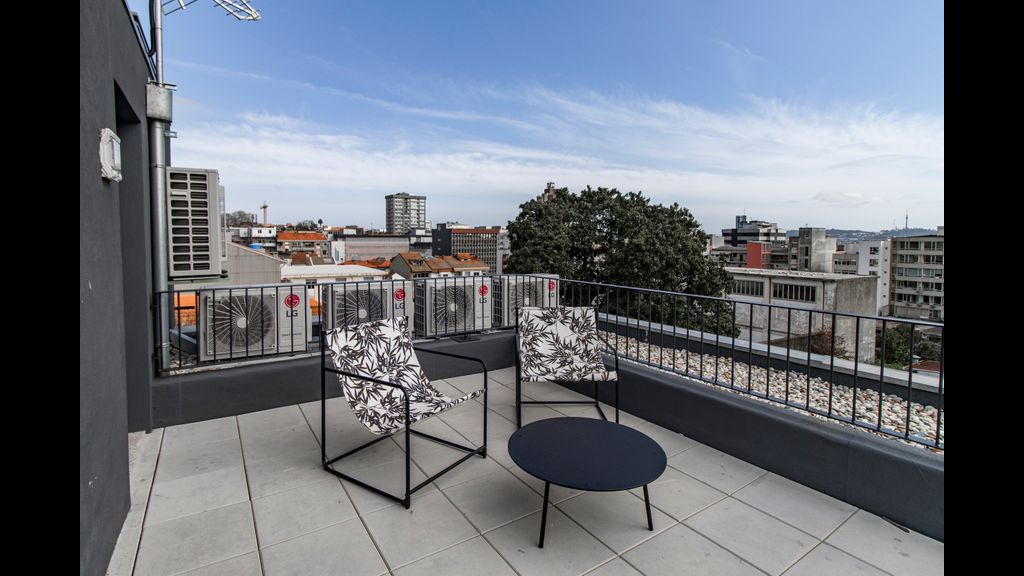Stunning 2BR Apartment w/ Terrace by LovelyStay