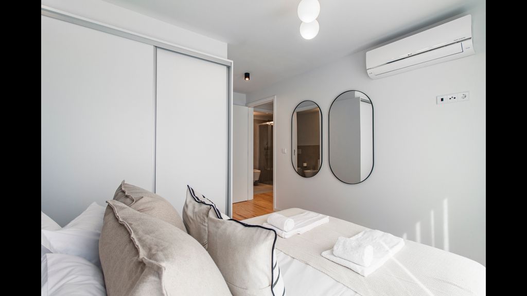 Stunning 2BR Apartment w/ Terrace by LovelyStay