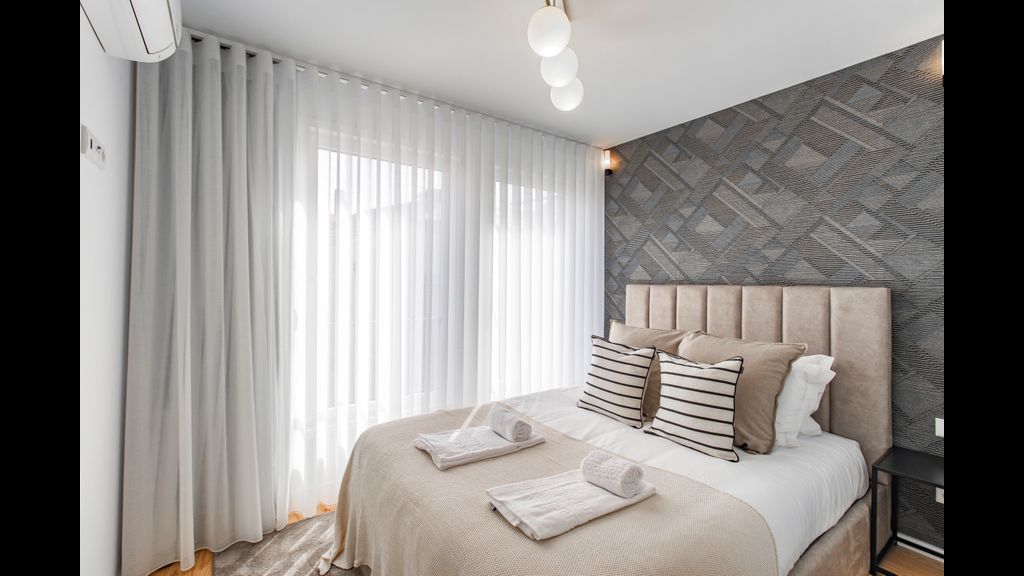 Stunning 2BR Apartment w/ Terrace by LovelyStay