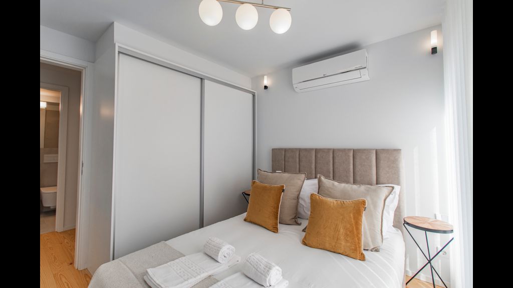 Stunning 2BR Apartment w/ Terrace by LovelyStay