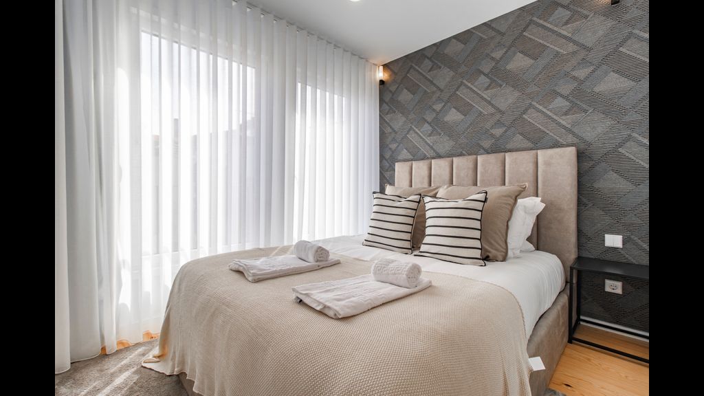 Stunning 2BR Apartment w/ Terrace by LovelyStay
