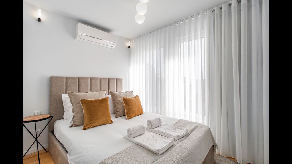 Stunning 2BR Apartment w/ Terrace by LovelyStay
