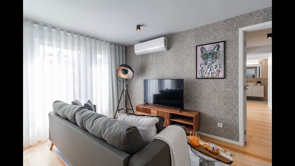 Stunning 2BR Apartment w/ Terrace by LovelyStay