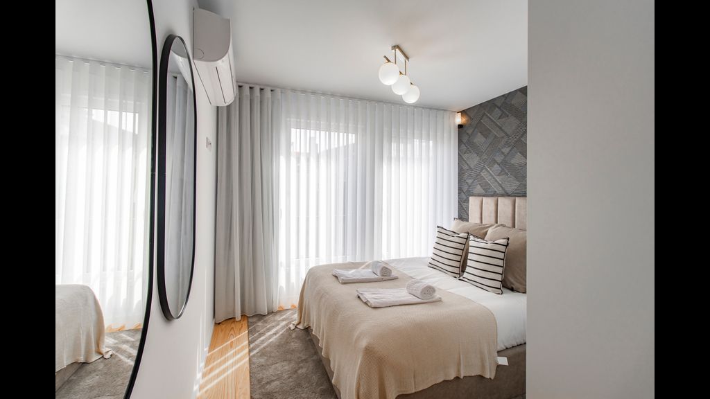 Stunning 2BR Apartment w/ Terrace by LovelyStay