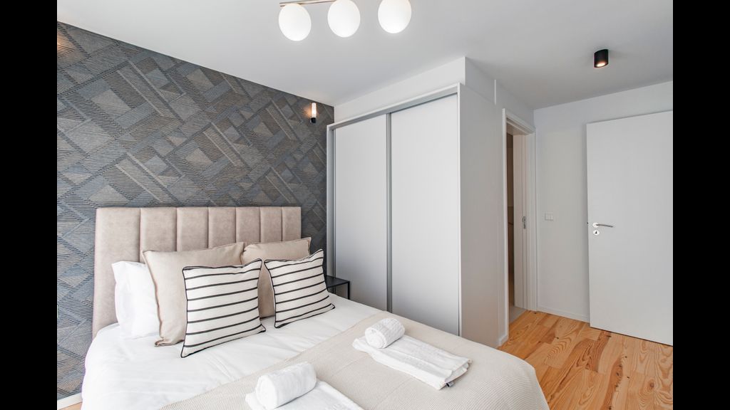 Stunning 2BR Apartment w/ Terrace by LovelyStay