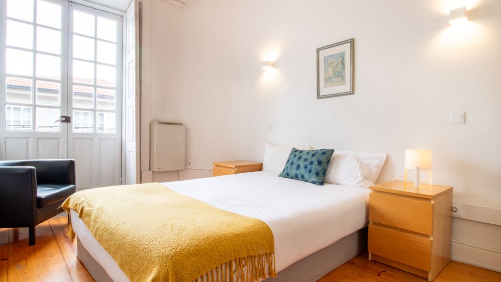 Porto 61 - Bright 2BR w/ Balcony by LovelyStay