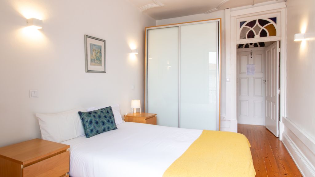 Porto 61 - Bright 2BR w/ Balcony by LovelyStay