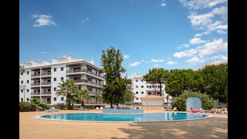 Elegance Apartment W/ Balcony & Pool by LovelyStay