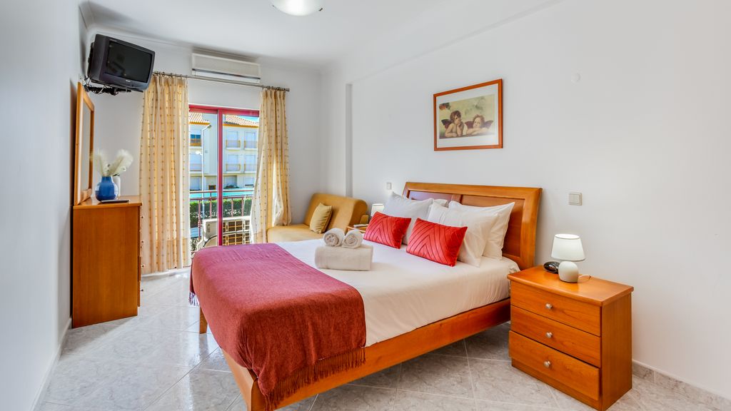 Serene Apartment W/ Balcony and Pool by LovelyStay