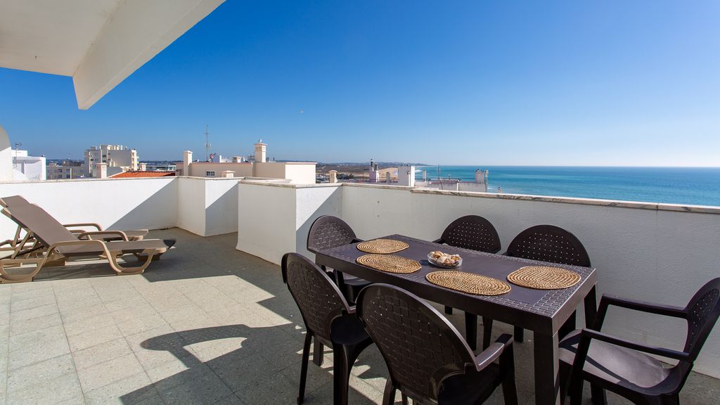 Beach View 2BR with Balcony by LovelyStay