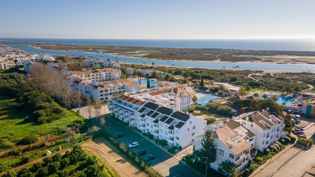 Golden Tavira 1BDR W/ Balcony & Pool by LovelyStay