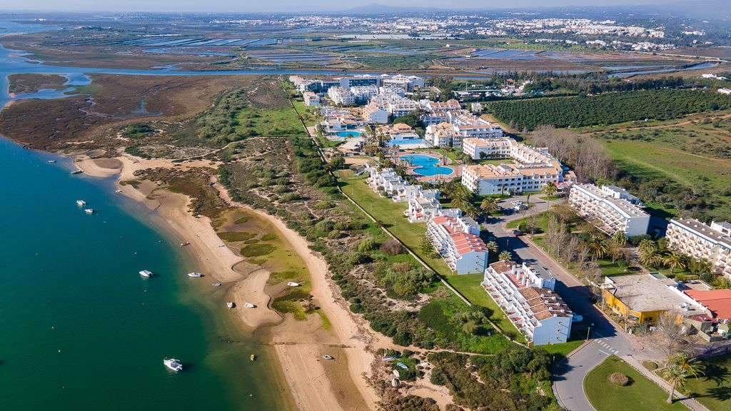 Golden Tavira 1BDR W/ Balcony & Pool by LovelyStay