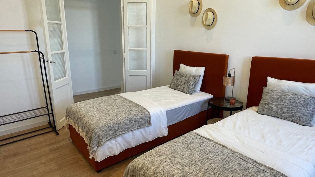 Renovated 3 BDR Duplex With Balcony by LovelyStay
