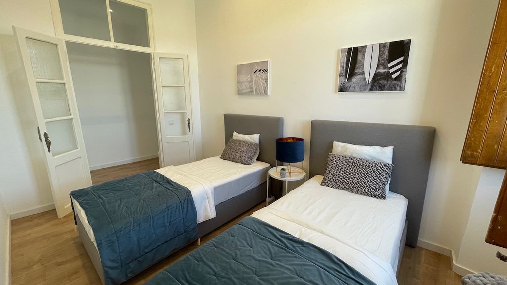 Renovated 3 BDR Duplex With Balcony by LovelyStay