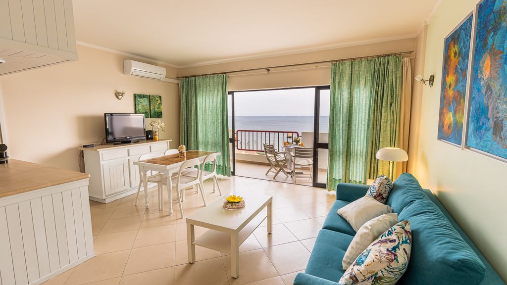 Beachfront 1 BDR Apartment With Pool by LovelyStay