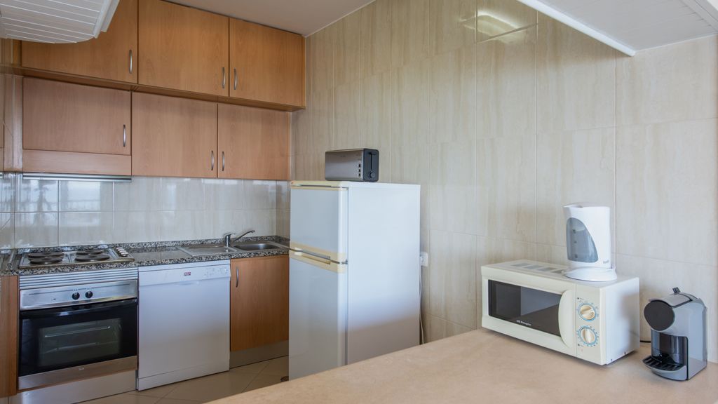 Beachfront 1 BDR Apartment With Pool by LovelyStay