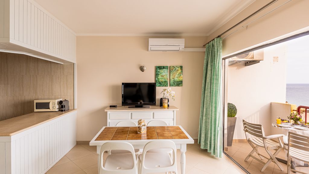 Beachfront 1 BDR Apartment With Pool by LovelyStay