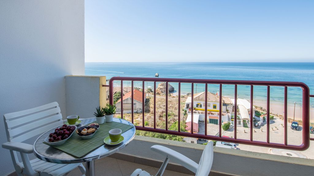 Beachfront 1 BDR Apartment With Pool by LovelyStay