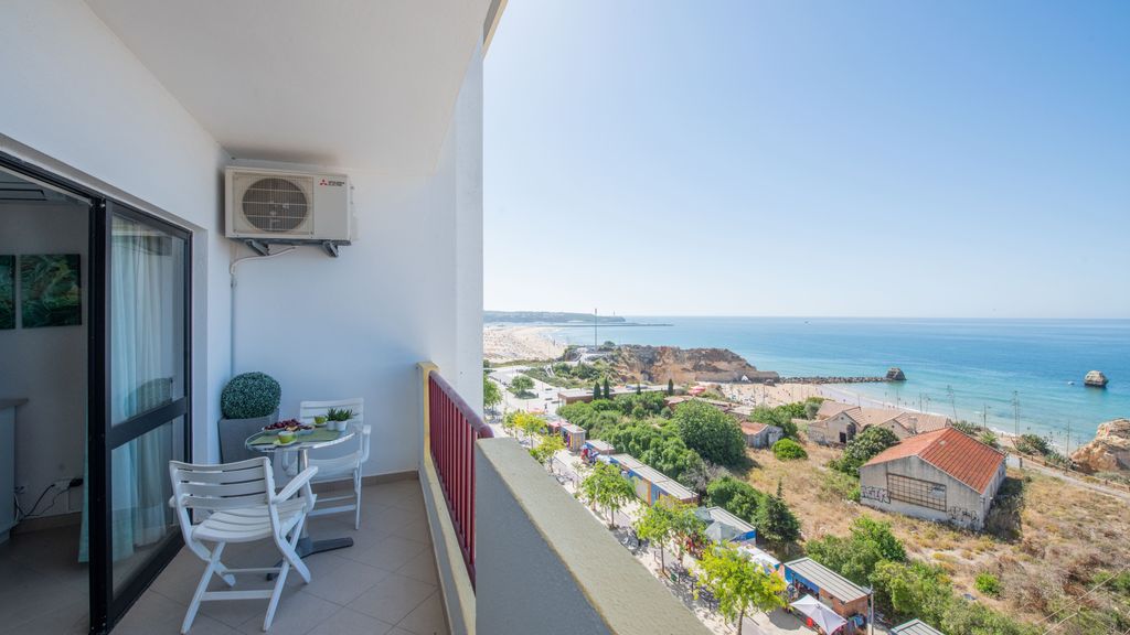 Beachfront 1 BDR Apartment With Pool by LovelyStay