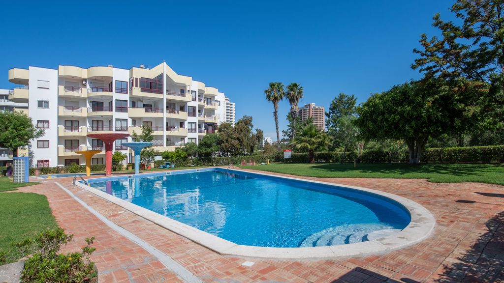 Beachfront 1 BDR Apartment With Pool by LovelyStay