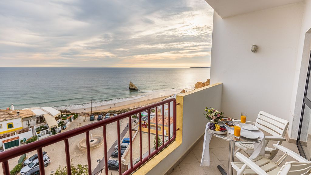 Beachfront 1 BDR Apartment With Pool by LovelyStay