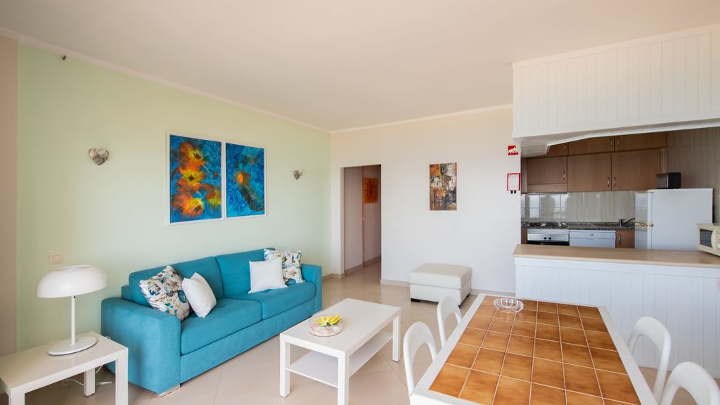 Beachfront 1 BDR Apartment With Pool by LovelyStay