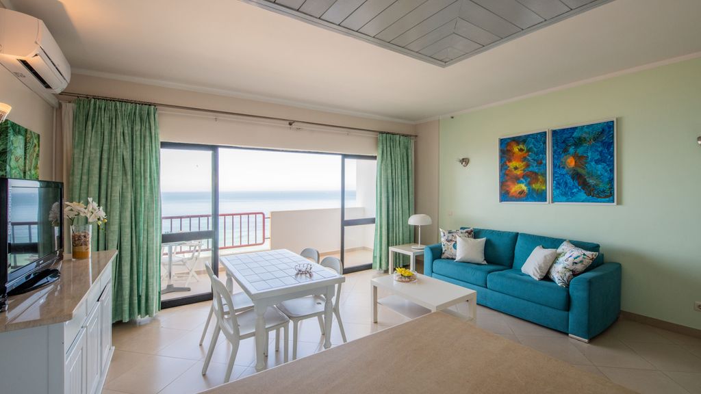 Beachfront 1 BDR Apartment With Pool by LovelyStay