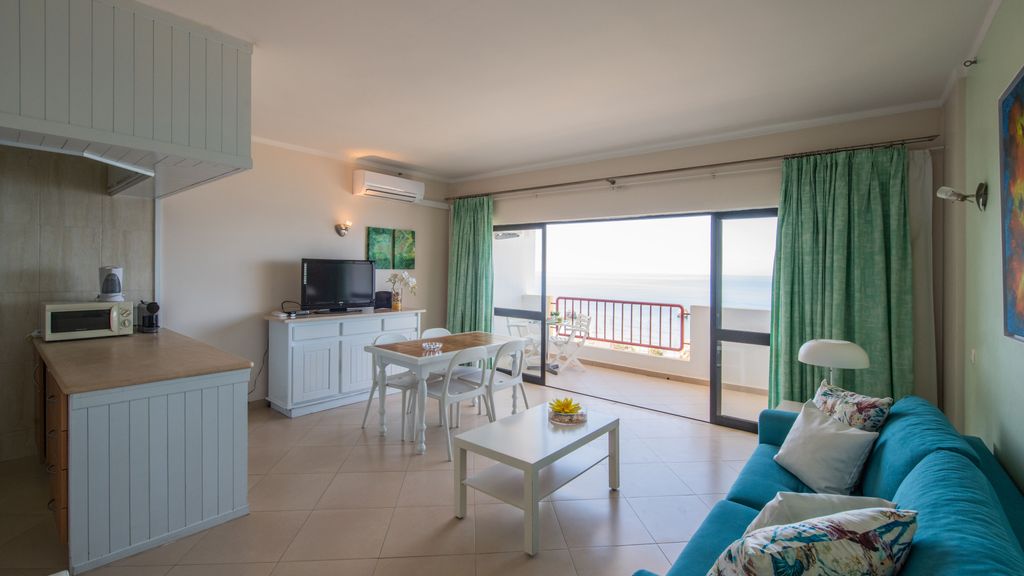 Beachfront 1 BDR Apartment With Pool by LovelyStay