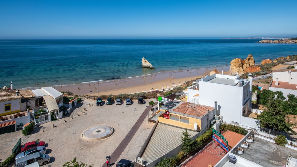 Beachfront 1 BDR Apartment With Pool by LovelyStay
