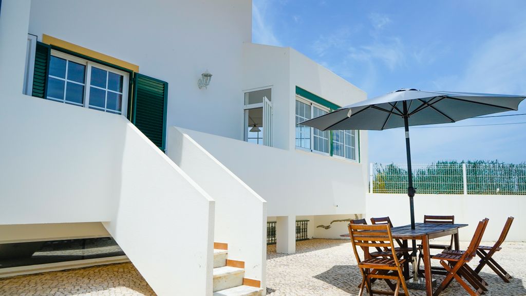Serene Duplex House With Patio by LovelyStay