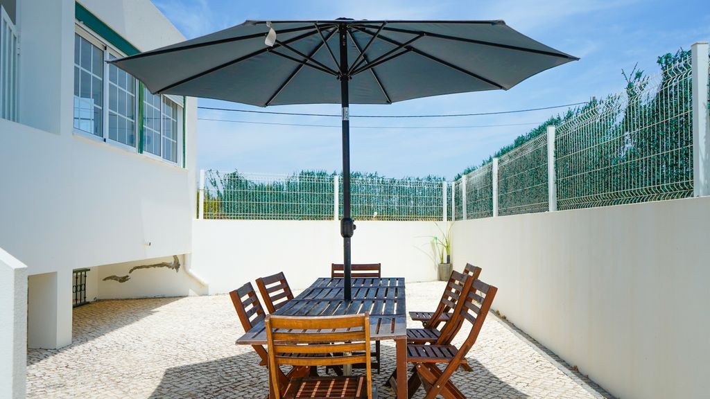 Serene Duplex House With Patio by LovelyStay