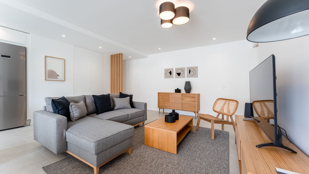Modern 2BR w/ Rooftop Pool & Parking by LovelyStay