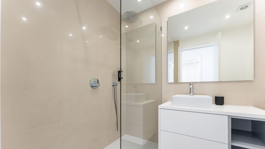 Modern 2BR w/ Rooftop Pool & Parking by LovelyStay